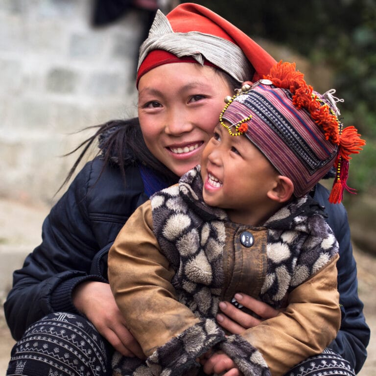 Happy hmong woman and child, sapa, vietnam