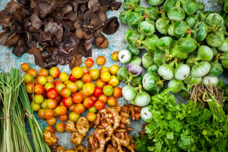 Fresh organic vegetables, herbs and spices at asian market